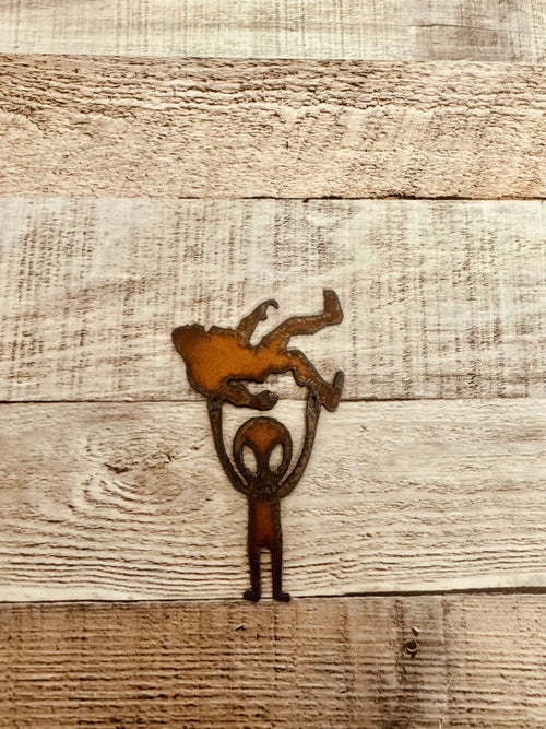 Alien Holding Bigfoot Rustic Metal Magnet Made in USA